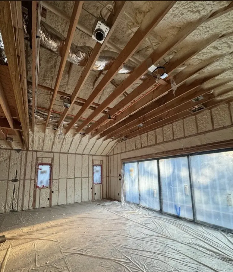 Interior walls and ceiling insulated with spray foam during new construction in Virginia Beach
